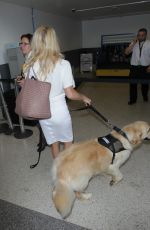 PAMELA ANDERSON Arrives at LAX Airport in Los Angeles 04/25/2017