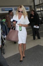 PAMELA ANDERSON Arrives at LAX Airport in Los Angeles 04/25/2017