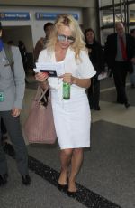 PAMELA ANDERSON Arrives at LAX Airport in Los Angeles 04/25/2017