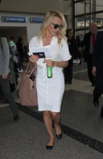 PAMELA ANDERSON Arrives at LAX Airport in Los Angeles 04/25/2017