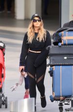 PERRIE EDWARDS at Heathrow Airport in London 04/17/2017