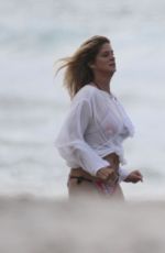 RACHEL HUNTER in Bikini on the Beach in New Zealand 03/19/2017
