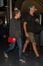 RILEY KEOUGH and Ben Smith-Petersen at LAX Airport in Los Angeles 04/10/2017