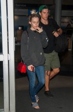 RILEY KEOUGH and Ben Smith-Petersen at LAX Airport in Los Angeles 04/10/2017
