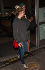 RILEY KEOUGH and Ben Smith-Petersen at LAX Airport in Los Angeles 04/10/2017