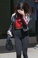 SELENA GOMEZ in Tights Leaves Gym in Los Angeles 04/13/2017