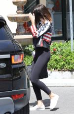 SELENA GOMEZ in Tights Leaves Gym in Los Angeles 04/13/2017