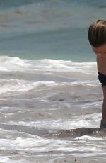 SIENNA MILLER in Bikini at a Beach in Cancun 04/02/2017
