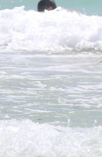 SIENNA MILLER in BIKINI on the Beach in Cancun 04/05/2017