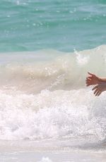 SIENNA MILLER in BIKINI on the Beach in Cancun 04/05/2017