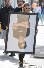 SOFIA RICHIE Holds Framed Photograph of Lou Reed Out in Los Angeles 04/24/2017