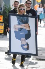 SOFIA RICHIE Holds Framed Photograph of Lou Reed Out in Los Angeles 04/24/2017