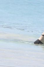 UMA THURMAN in Bikini on the Beach in St Barth 04/01/2017