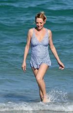UMA THURMAN on the Set of a Commercial on the Beach in Florida 04/26/2017