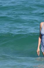 UMA THURMAN on the Set of a Commercial on the Beach in Florida 04/26/2017