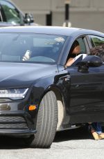 VANESSA HUDGENS Gets a Flat Tire while Shopping with STELLA in Los Angeles 04/28/2017