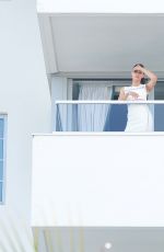ALEXANDRA DADDARIO at Her Hotel Balcony in Miami 05/14/2017