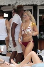 AMBER TURNER in Bikini on the Beach in Marbella 05/28/2017