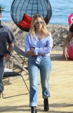 ASHLEY BENSON in Jeans Leaves Martinez Beach in Cannes 05/21/2017
