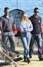 ASHLEY BENSON in Jeans Leaves Martinez Beach in Cannes 05/21/2017