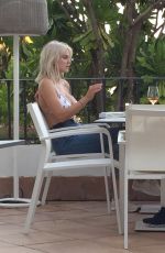 ASHLEY JAMES in Bikini Top at Her Hotel in Marbella 05/26/2017