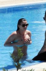 BROOKE VINCENT in Bikini at Pool of Her Hotel in Marbella 05/21/2017