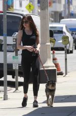 DAKOTA JOHNSON Out with Her Dog in Los Angeles 05/18/2017