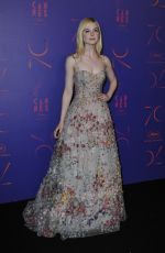 ELLE FANNING at Cannes Film Festival 70th Anniversary Dinner 05/23/2017