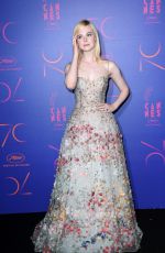 ELLE FANNING at Cannes Film Festival 70th Anniversary Dinner 05/23/2017