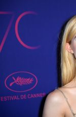 ELLE FANNING at Cannes Film Festival 70th Anniversary Dinner 05/23/2017