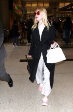 ELLE FANNING at Los Angeles International Airport 05/07/2017