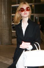 ELLE FANNING at Los Angeles International Airport 05/07/2017