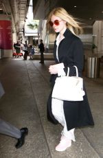 ELLE FANNING at Los Angeles International Airport 05/07/2017