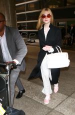 ELLE FANNING at Los Angeles International Airport 05/07/2017