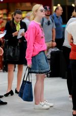 ELLE FANNING in Denim Skirt at Nice Airport 05/25/2017