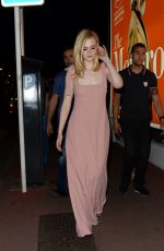 ELLE FANNING Walking Out on The Croisette in Cannes 05/19/2017