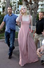 ELLE FANNING Walking Out on The Croisette in Cannes 05/19/2017
