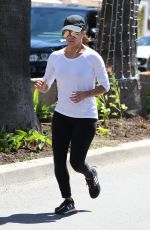 EVA LONGORIA Out Jogging in Cannes 05/19/2017