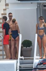 HAILEY BALDWIN in Bikini and CAMI MORRONE in Swimsuit at a Yacht in Cannes 05/23/2017