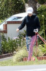 HEIDI MONTAG Walks Her Dog Out in Brentwood 05/29/2017
