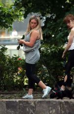 HILARY DUFF Walks Her Dog Out in New York 05/16/2017