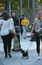 HILARY DUFF Walks Her Dog Out in New York 05/16/2017