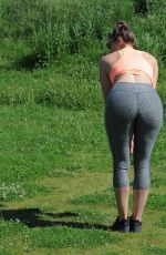 IMOGEN THOMAS Working Put at a Park in London 05/30/2017