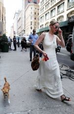 JENNIFER LAWRENCE Walks Her Dog Out in New York 05/19/2017