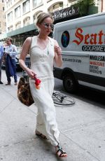 JENNIFER LAWRENCE Walks Her Dog Out in New York 05/19/2017