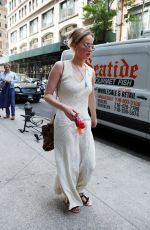 JENNIFER LAWRENCE Walks Her Dog Out in New York 05/19/2017