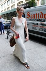 JENNIFER LAWRENCE Walks Her Dog Out in New York 05/19/2017