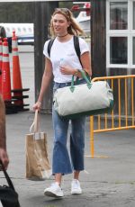 KARLIE KLOSS Arrives in the Hamptons for Memorial Day Weekend 05/26/2017