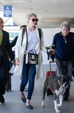 KATE UPTON with Her Dog at LAX Airport in Los Angeles 05/16/2017