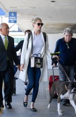 KATE UPTON with Her Dog at LAX Airport in Los Angeles 05/16/2017